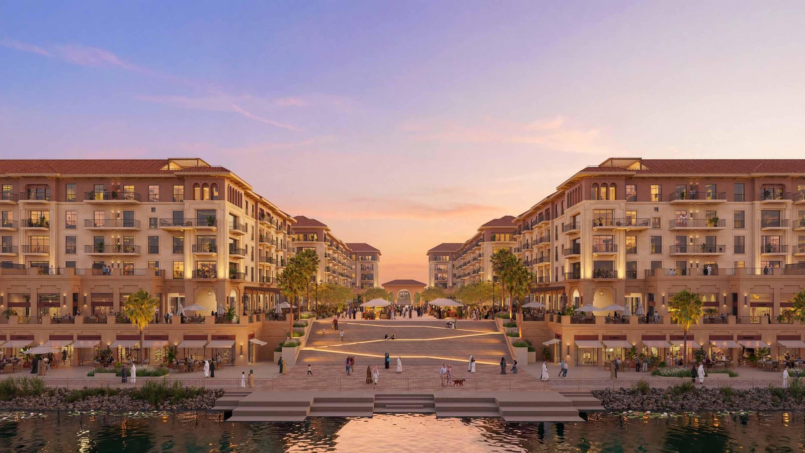 Bloom Living - Alhambra in Zayed City Abu Dhabi with Mediterranean architecture, lakefront promenade, and landscaped community views